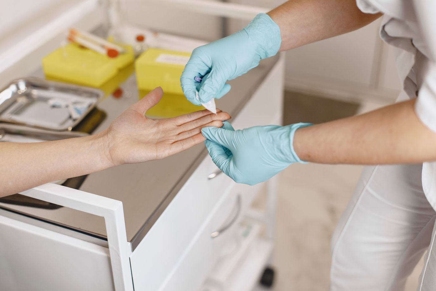 A clinician preparing wound care dressing supplies