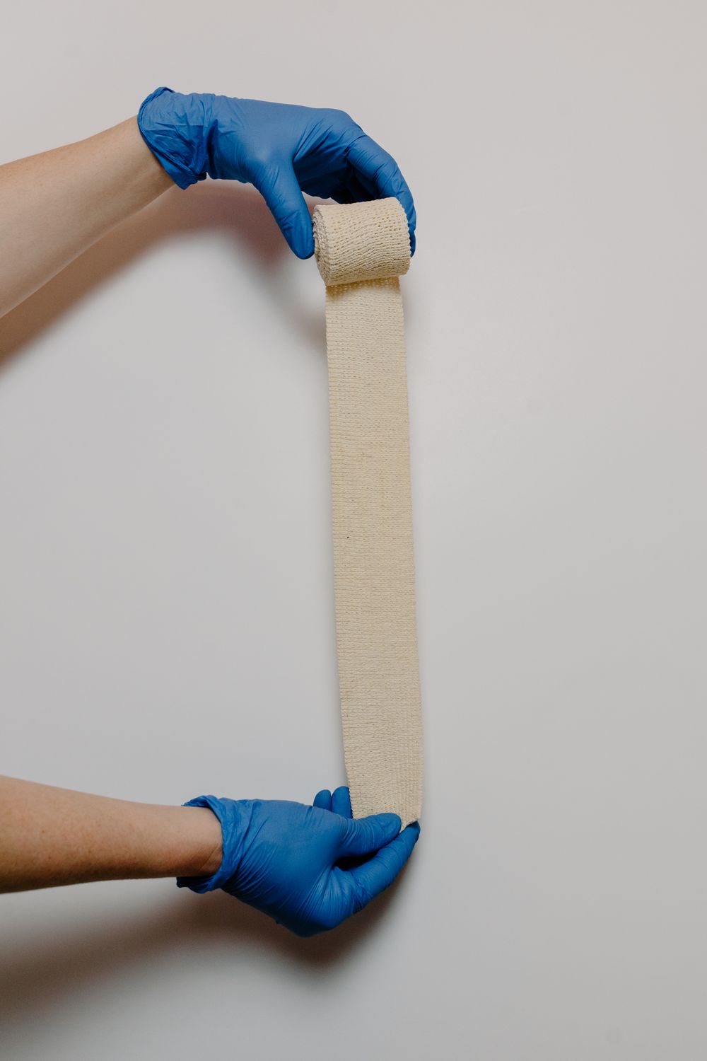 Healthcare professional providing patient wound care