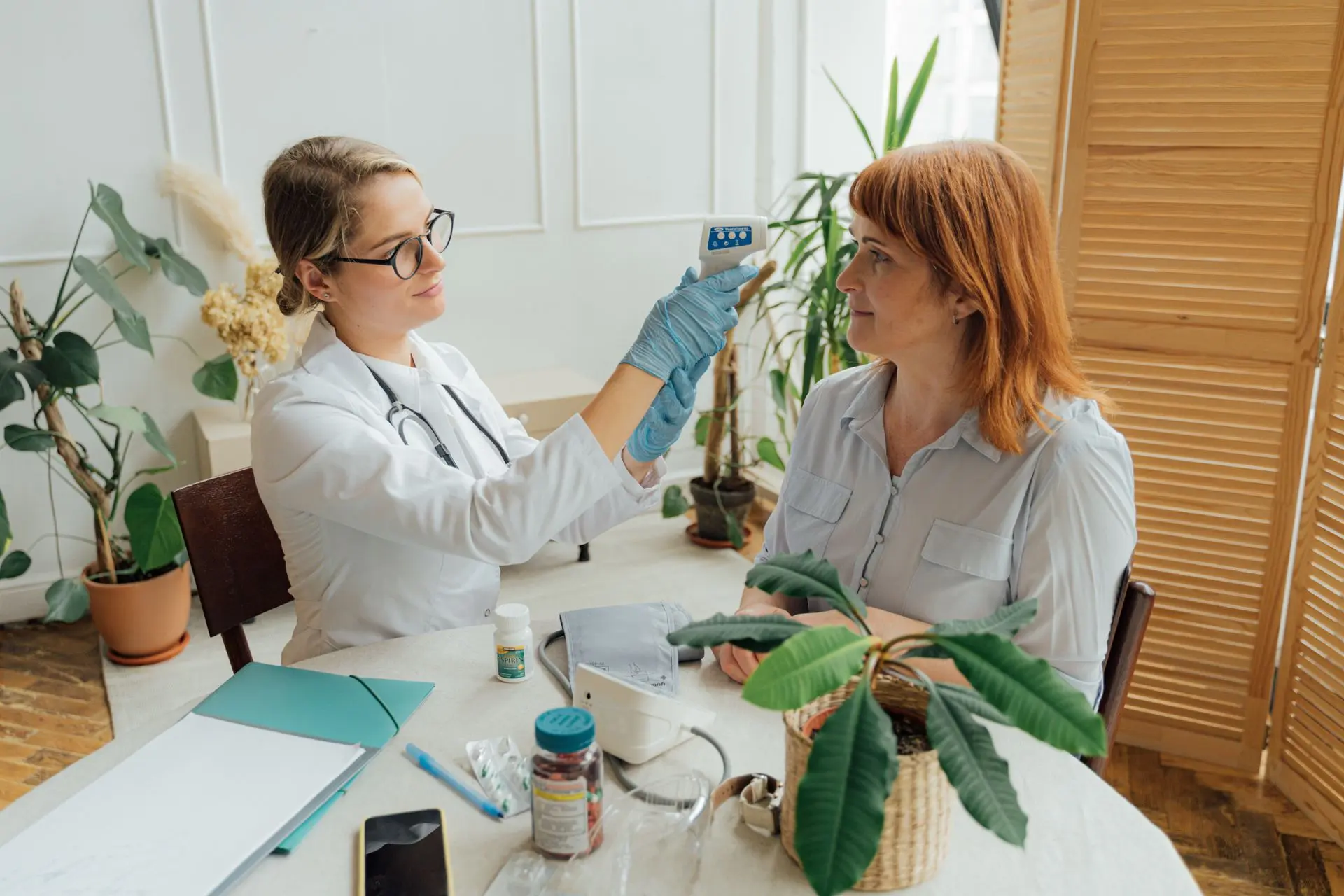 Care professional helping a senior patient safely at home