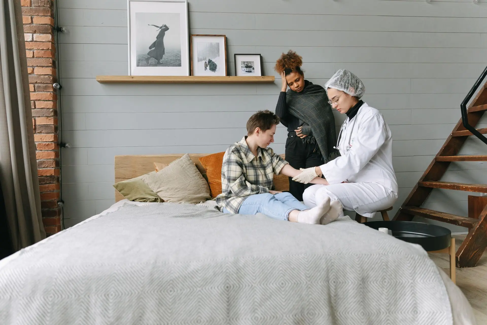 Medical specialist providing wound dressing treatment